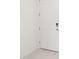 A sleek, white door with a smart lock system for enhanced security and modern convenience at 16332 Happy Eagle Dr, Clermont, FL 34714
