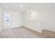 Upstairs loft space with carpet, view of community, and neutral walls provides flexible living at 16332 Happy Eagle Dr, Clermont, FL 34714