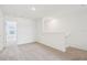 Open loft area with plush carpeting, bright and versatile space for a Gathering room or play area at 16332 Happy Eagle Dr, Clermont, FL 34714