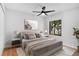 Bright bedroom with a comfortable bed and plenty of natural light at 2223 Stonington Ave # 2223, Orlando, FL 32817