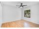 Spacious bedroom with hardwood floors and large window at 2223 Stonington Ave # 2223, Orlando, FL 32817