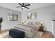 Serene bedroom with plush bed and window views at 2223 Stonington Ave # 2223, Orlando, FL 32817