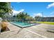 Community pool with lounge chairs and tennis courts at 2223 Stonington Ave # 2223, Orlando, FL 32817