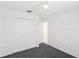 Bedroom with ceiling fan, double door closet and gray carpeting at 230 Bay Meadow Dr, Kissimmee, FL 34746