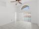 Bedroom with tile floors, sliding door to pool, and a ceiling fan at 230 Bay Meadow Dr, Kissimmee, FL 34746