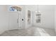 White door and tile floor near a sunny window at 230 Bay Meadow Dr, Kissimmee, FL 34746