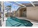 Inviting screened-in pool area with ample patio space at 230 Bay Meadow Dr, Kissimmee, FL 34746