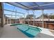 Enclosed screened pool area with a relaxing atmosphere at 230 Bay Meadow Dr, Kissimmee, FL 34746