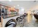 Spacious kitchen featuring granite countertops and stainless steel appliances and breakfast bar with seating at 236 Barrington Dr, Haines City, FL 33844