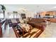Open concept living room with view of kitchen and dining area, featuring neutral colors at 236 Barrington Dr, Haines City, FL 33844