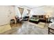 Bright living room boasts tiled floors, decorative curtains, and comfortable seating at 236 Barrington Dr, Haines City, FL 33844