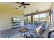 Spacious screened porch with seating area and beautiful views at 2532 Civitas Pl, Casselberry, FL 32707