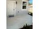 Inviting front porch with stylish tile flooring and a welcoming 'HOME' doormat at 388 Chinaberry Ave, Oviedo, FL 32765