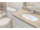 Updated bathroom with granite vanity and tile shower at 6929 Central Ave, Mulberry, FL 33860