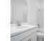 This bathroom features a combination shower and bathtub, single sink vanity and chrome fixtures at 4723 Coral Harbour Rd, Kissimmee, FL 34758