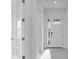 This entryway features ceramic tile flooring, a glass front door and neutral paint at 4723 Coral Harbour Rd, Kissimmee, FL 34758
