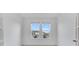 Bright room with white walls, and a large window showcasing an outside view at 4723 Coral Harbour Rd, Kissimmee, FL 34758