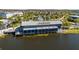 Enjoy lakefront dining at the community restaurant featuring an outdoor patio, covered seating, and ample parking at 8279 Nemours Pkwy, Orlando, FL 32827