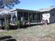 Backyard with screened porch and deck at 910 Rangeline Rd, Longwood, FL 32750