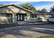 House exterior boasts a modern double door entry and well-manicured landscaping at 910 Rangeline Rd, Longwood, FL 32750