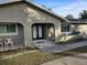 House exterior boasts a modern double door entry and well-manicured landscaping at 910 Rangeline Rd, Longwood, FL 32750