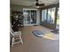 Spacious screened-in porch with tile floor at 910 Rangeline Rd, Longwood, FL 32750