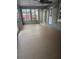 Spacious sunroom with new flooring and a ceiling fan at 910 Rangeline Rd, Longwood, FL 32750