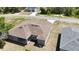 Birds-eye view of the roof, backyard, and the surrounding area showcasing the home's location at 1314 Hillsborough Ct, Poinciana, FL 34759