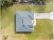 Aerial view of a single-story home showcasing the roof, lawn, and driveway at 3041 Sw 168Th Loop, Ocala, FL 34473