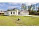 Beautiful single-story home with a well-maintained lawn and a driveway, offering a welcoming curb appeal at 3041 Sw 168Th Loop, Ocala, FL 34473