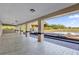 A covered patio area shows a deck and pond in the distance at 3145 Packard Ave, St Cloud, FL 34772