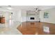 Living room with hardwood floors and fireplace at 2141 Camellia Dr, Longwood, FL 32779