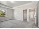 Spacious main bedroom featuring a tray ceiling and bright natural light at 3207 Stratton Cir, Kissimmee, FL 34744