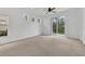 Spacious main bedroom with ceiling fan and sliding glass doors to the patio at 530 Harbor Winds Ct, Winter Springs, FL 32708