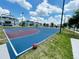 The basketball court provides a space for a fun and competitive workout in the Florida sunshine at 8943 Cabot Cliffs Dr, Davenport, FL 33896