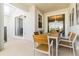 Outdoor patio with a dining set, ideal for enjoying meals outside at 8943 Cabot Cliffs Dr, Davenport, FL 33896