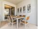 Outdoor patio with a dining table and seating, perfect for outdoor entertaining and relaxation at 8943 Cabot Cliffs Dr, Davenport, FL 33896