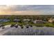 Lakefront property showcasing multiple homes with lush landscaping at 2115 Lake Crescent Ct, Windermere, FL 34786