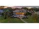 Luxury home with pool and lakefront access; expansive backyard at 2115 Lake Crescent Ct, Windermere, FL 34786