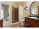 Elegant bathroom with a large shower and granite vanity at 2115 Lake Crescent Ct, Windermere, FL 34786