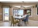 Bright breakfast nook boasts stunning lake views from its large windows at 2115 Lake Crescent Ct, Windermere, FL 34786