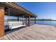 Relaxing dock with a white swing and scenic lake view at 2115 Lake Crescent Ct, Windermere, FL 34786