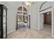 Bright and spacious foyer with tile floors and access to other rooms at 2115 Lake Crescent Ct, Windermere, FL 34786
