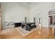 Spacious game room with hardwood floors and views to other rooms at 2115 Lake Crescent Ct, Windermere, FL 34786