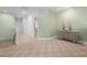 Upstairs hallway with light walls and neutral carpeting at 2115 Lake Crescent Ct, Windermere, FL 34786