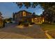 Grand entrance with a brick driveway, and lighting at 2115 Lake Crescent Ct, Windermere, FL 34786