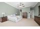 Bright and airy main bedroom with a spacious layout and plenty of closet space at 2115 Lake Crescent Ct, Windermere, FL 34786