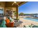 Inviting pool area with patio furniture and lake view at 2115 Lake Crescent Ct, Windermere, FL 34786