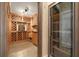 Custom wine cellar with built-in racking and climate control at 2115 Lake Crescent Ct, Windermere, FL 34786