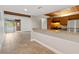 Inviting living space with kitchen counter bar and stainless-steel appliances providing modern aesthetics at 510 Cranes Way # 306, Altamonte Springs, FL 32701